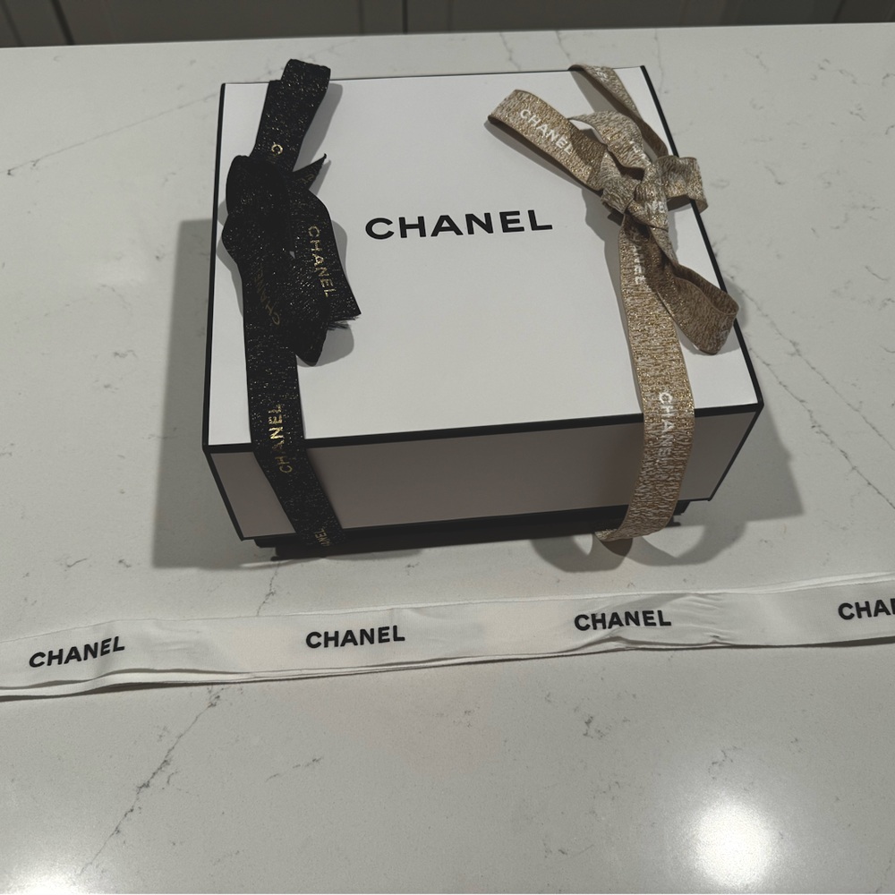 Chanel gift box 🎁 with three different colored ribbons! 🎀